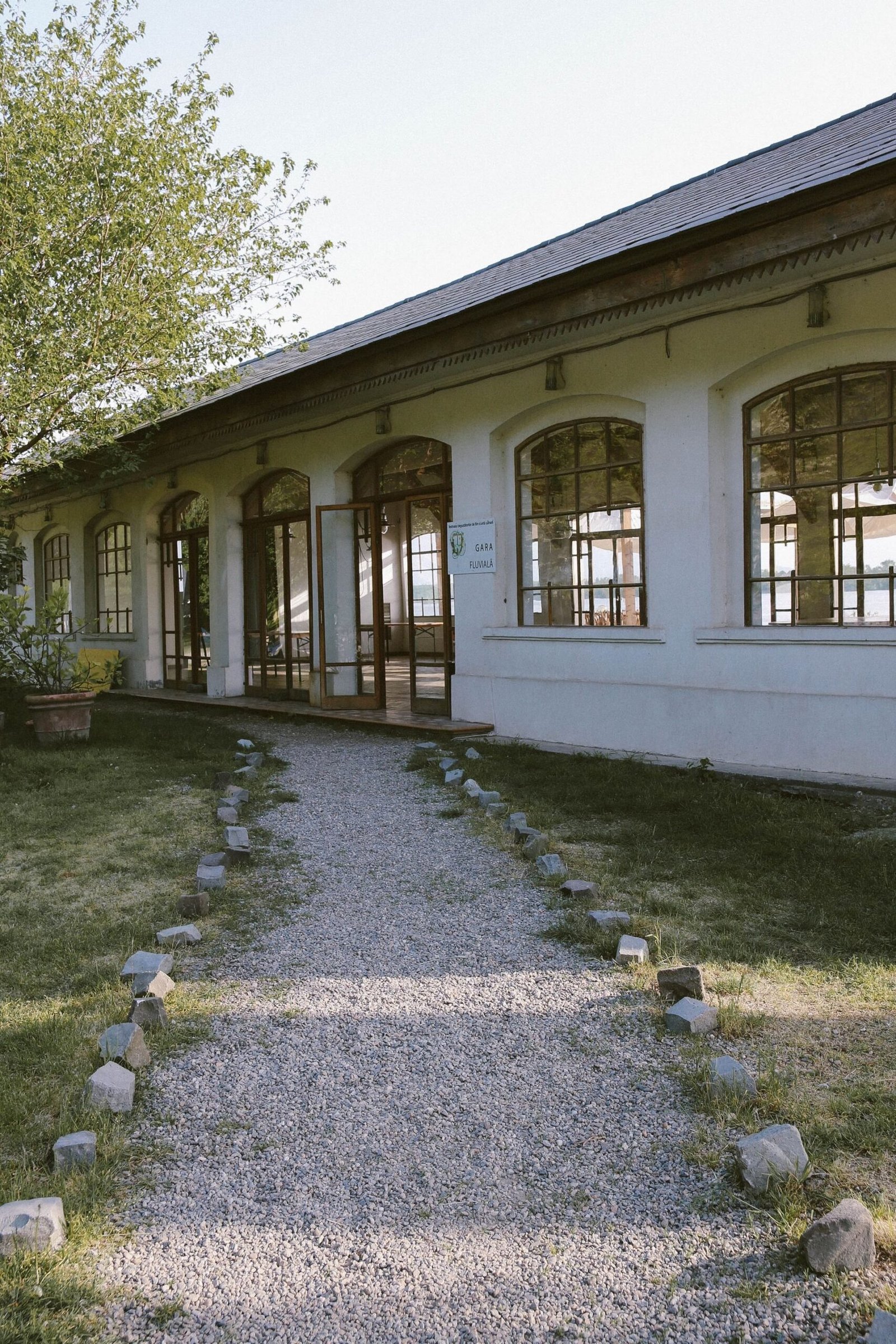 Rustic building with a gravel path